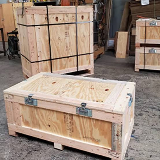 Wooden crates stacked and ready for shipment, Pallet Business.