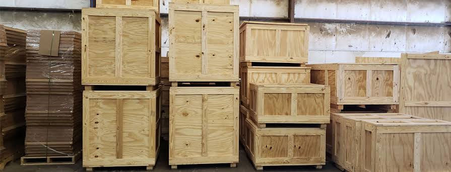 Stacked wooden crates in storage warehouse, ready for shipping, Pallet Business.