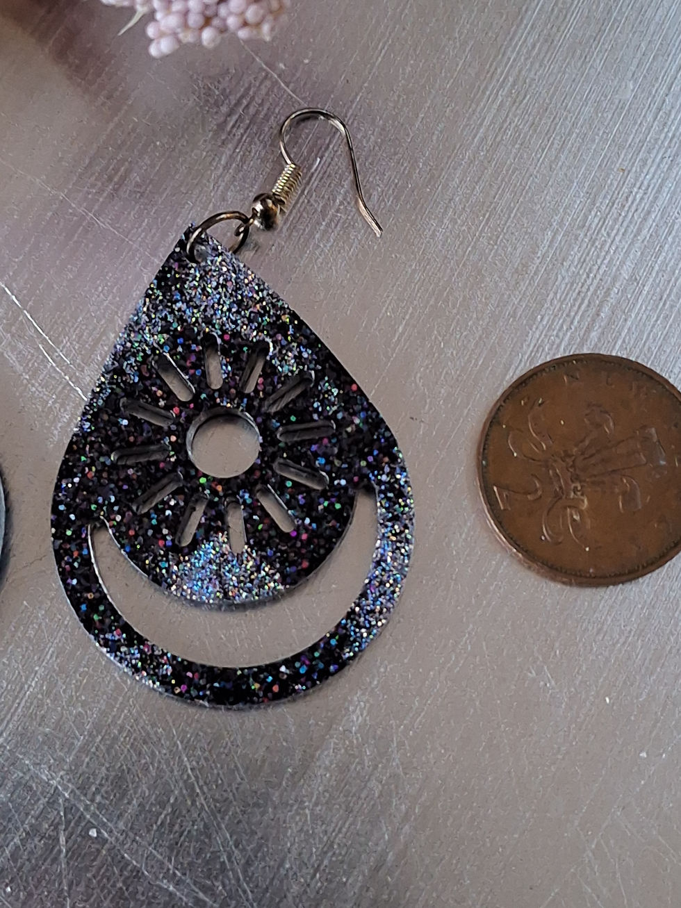 Thumbnail: Handmade silver and black glitter celestial earrings