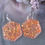 Thumbnail: Handmade peach colour change glitter hexagon earrings on silver p