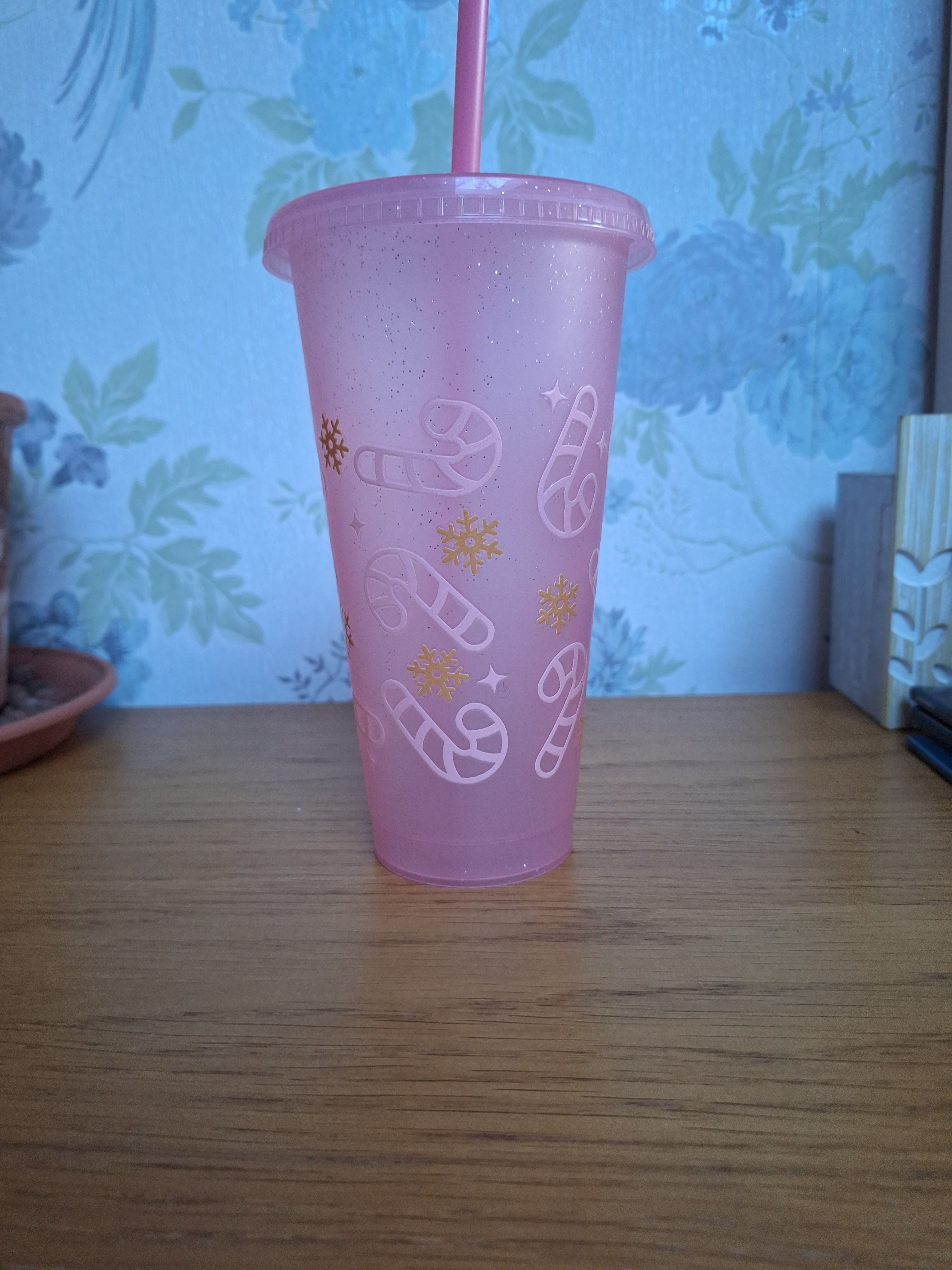 Candy cane plastic cup with plastic straw