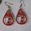 Thumbnail: Handmade red glitter Christmas candy cane earrings