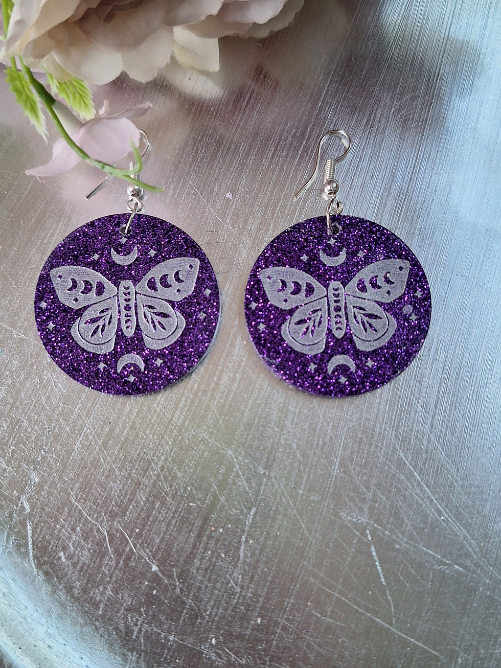 Purple glitter luna butterfly earrings on silver plated hoo