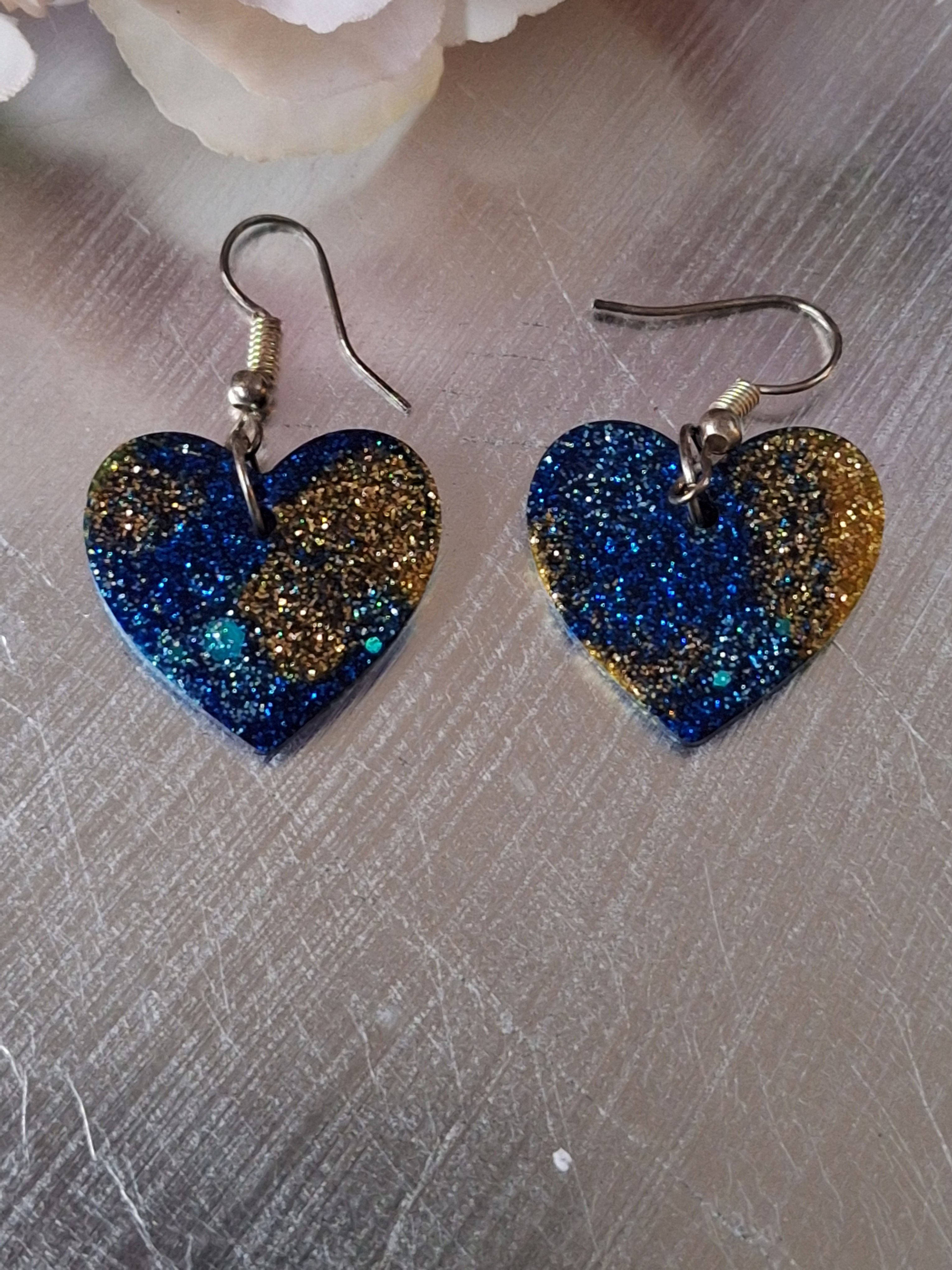 Handmade blue and gold glitter heart earrings