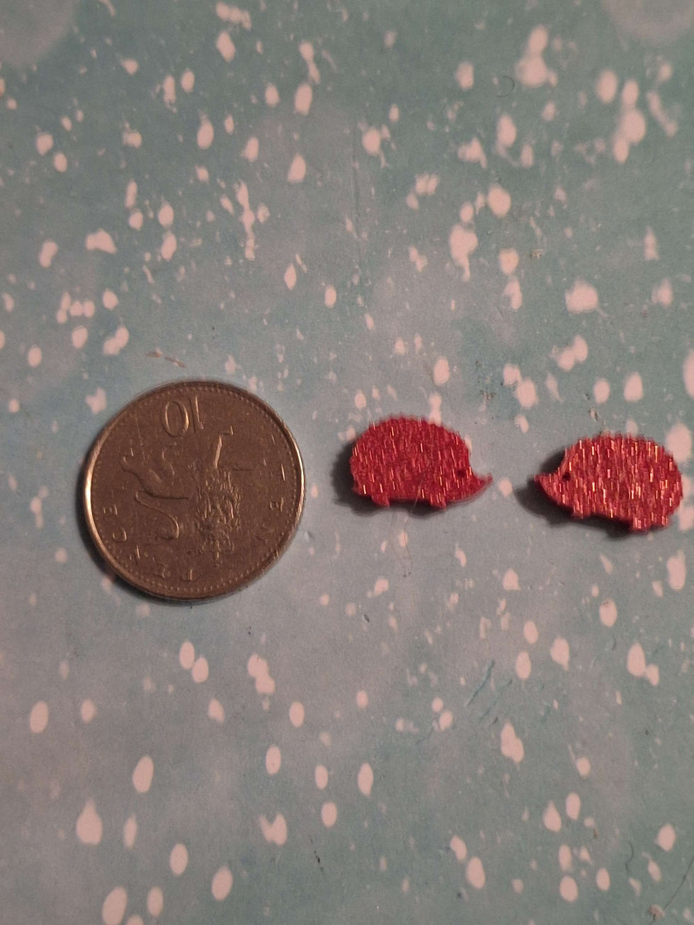 Thumbnail:  Handmade pink hedgehog studs on silver plated posts