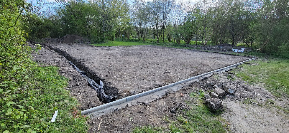 Soakaways and kerb stones forming the parking area.