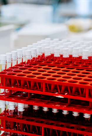 red plastic container with white powder_