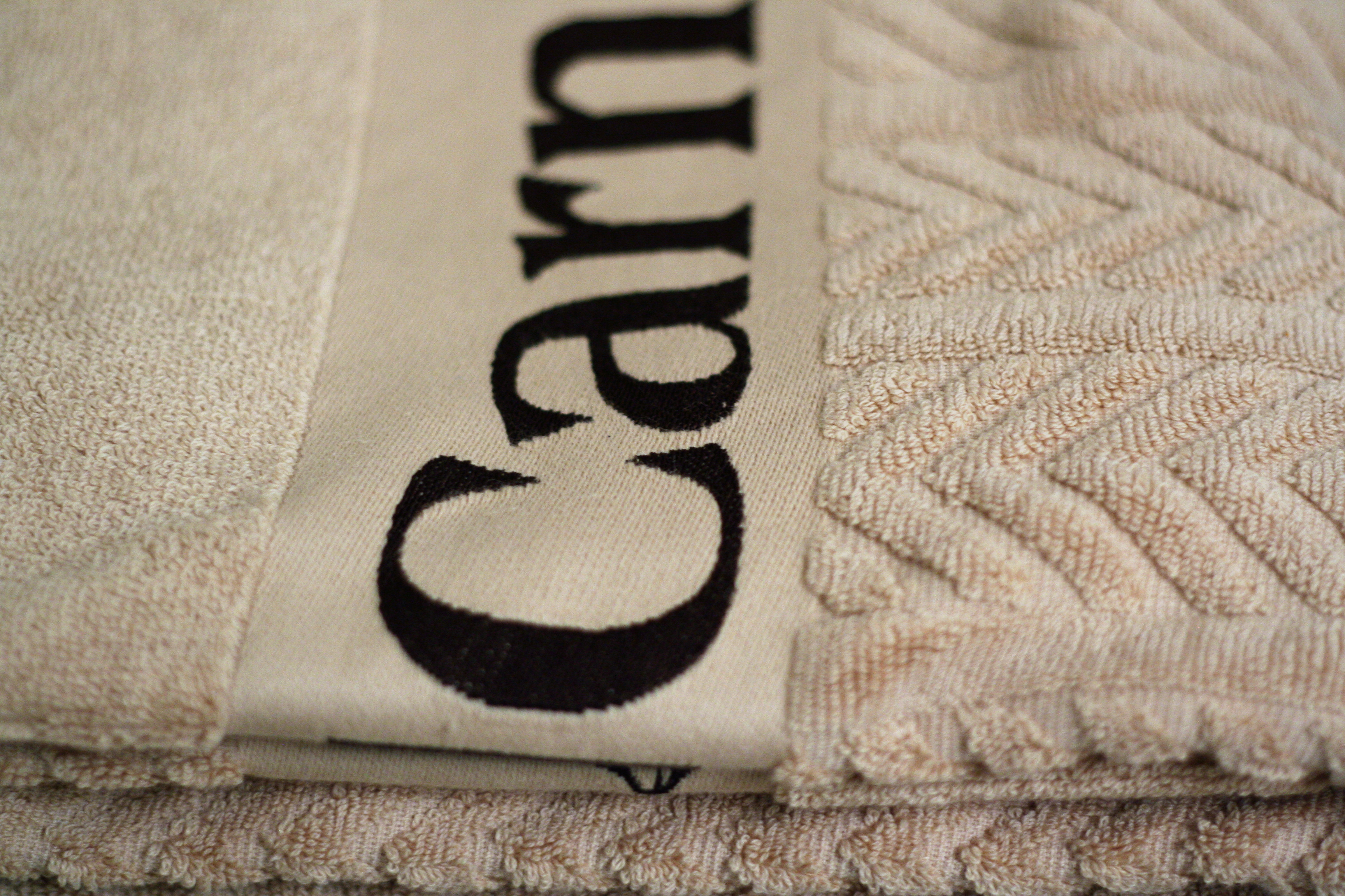 Woven border towel
