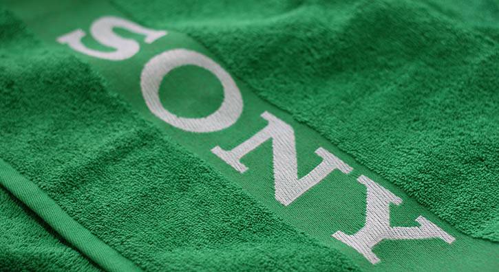 Jacquard woven border towel