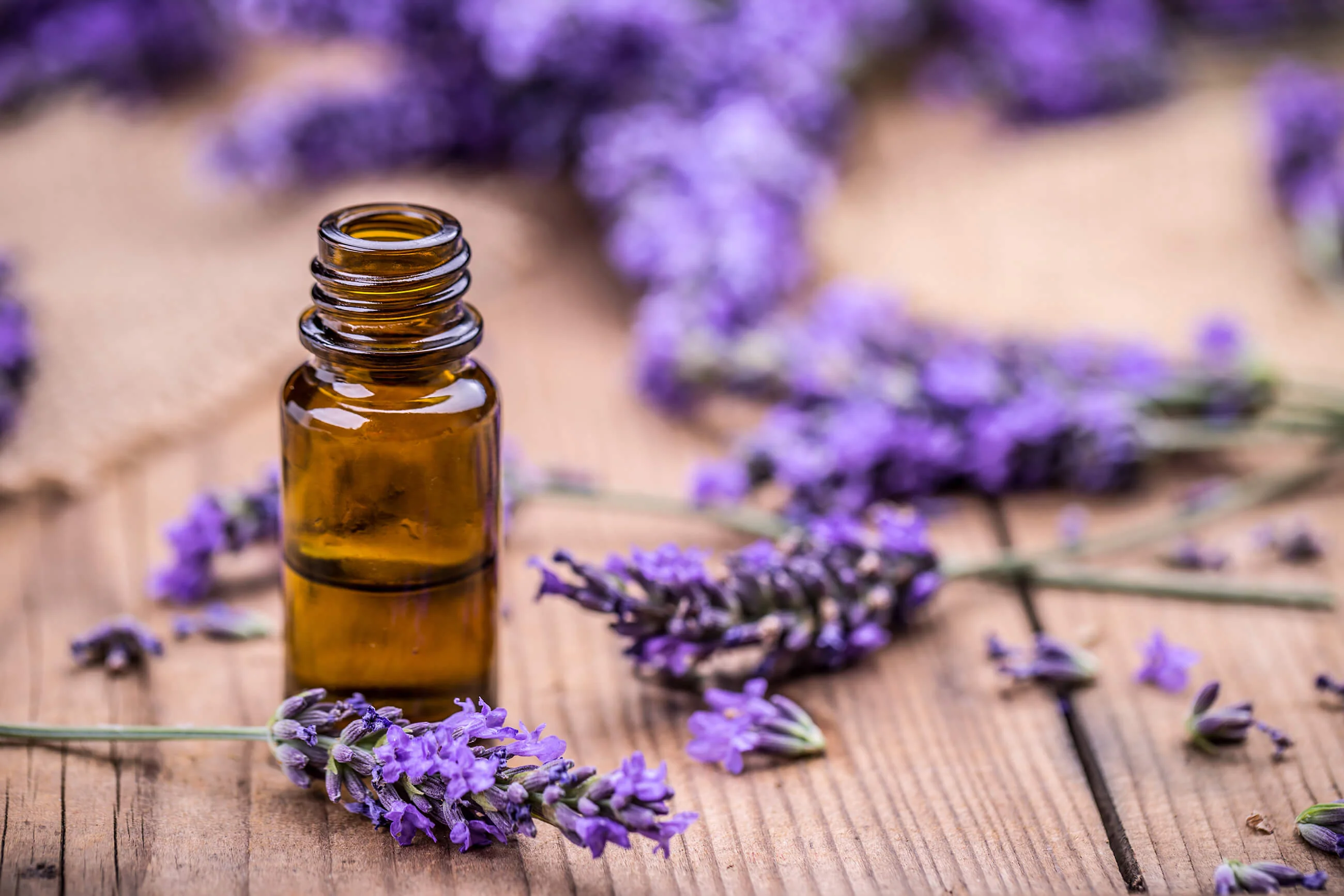 Lavender liquid in a small bottle.