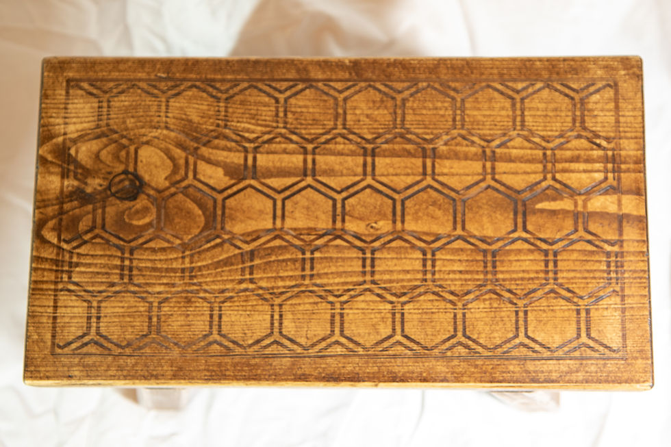 Thumbnail: detail of wooden footstool with honeycomb pattern