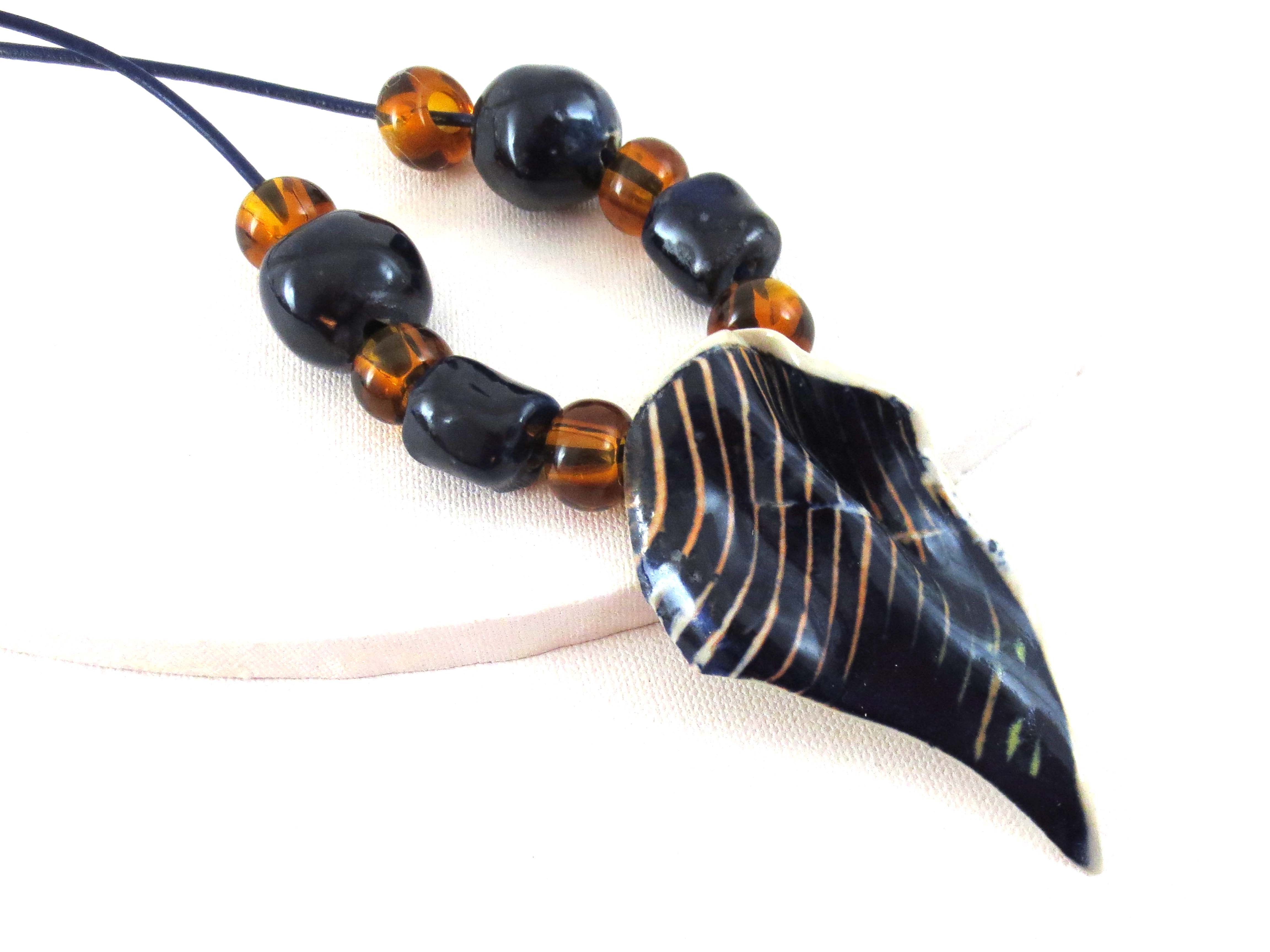 Black & gold ceramic pendant