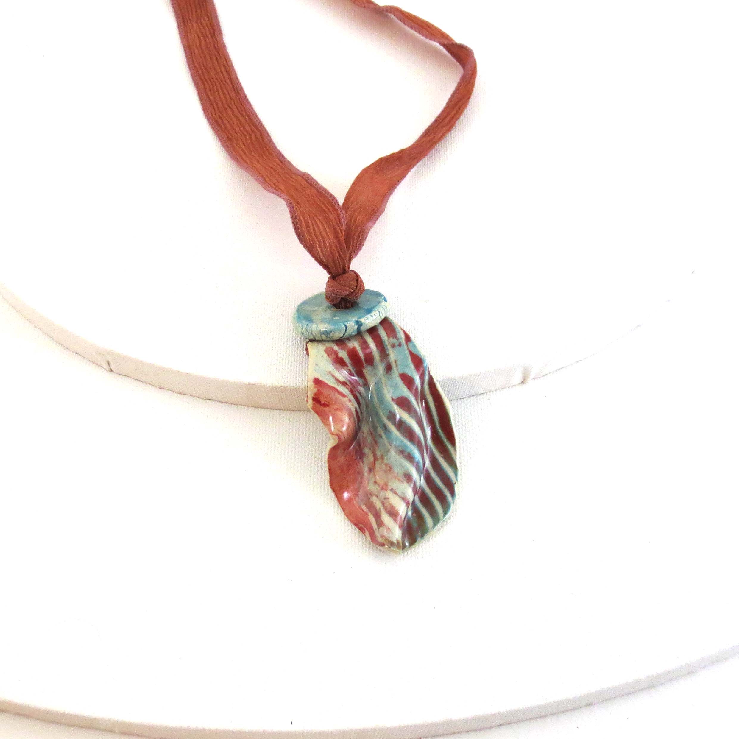 Turquoise & rust ceramic pendant