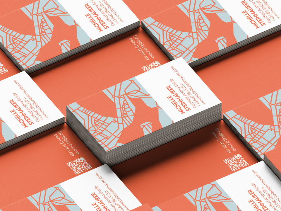 Visitenkarten von Michelle Steinmaurer, Muster des Stadtplans von Salzburg in orange und grau-blau