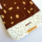 Close-up detail of the Almond Crunch MagSafe Case showing almond-inspired details.