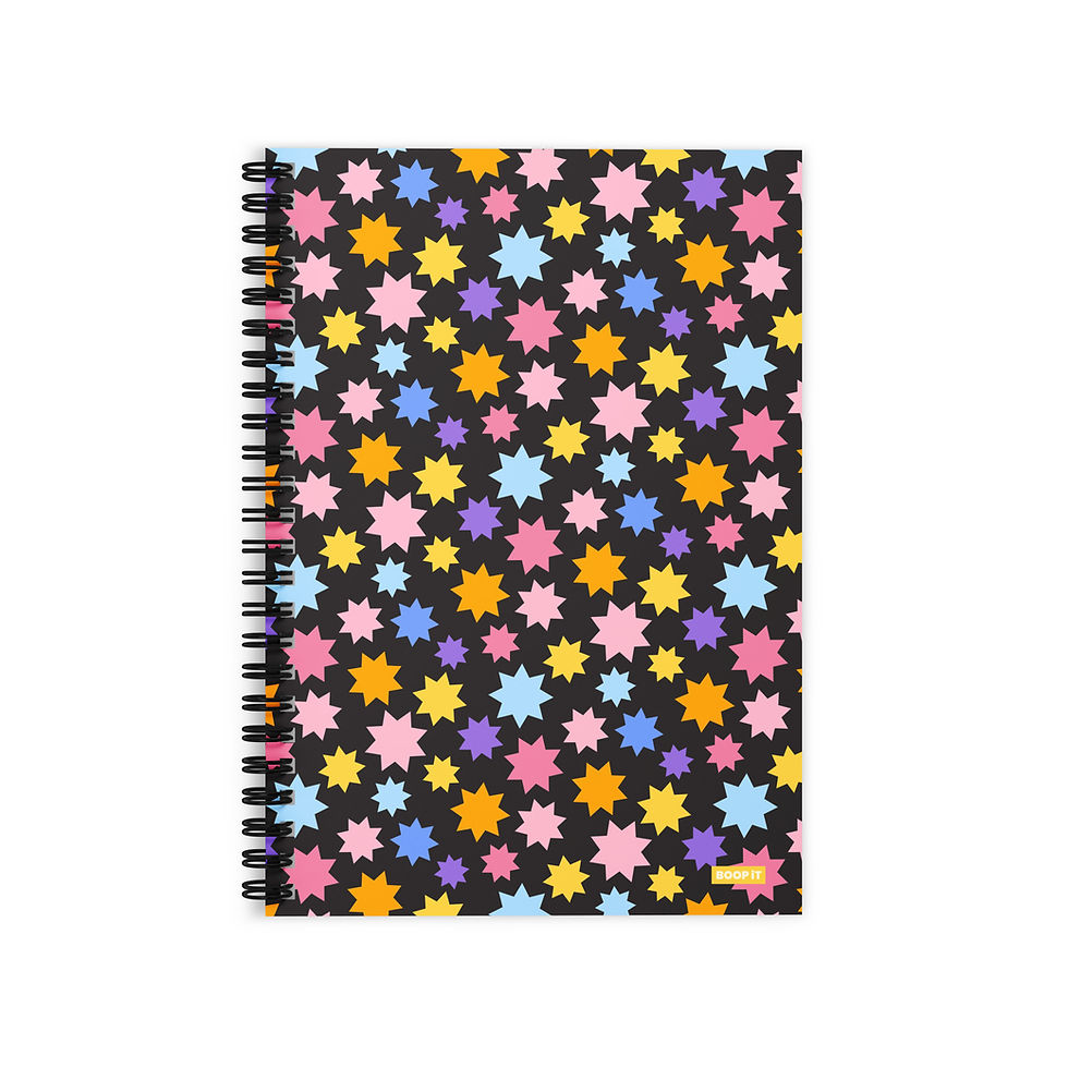 Happy Stars spiral notebook with colorful star pattern on black background