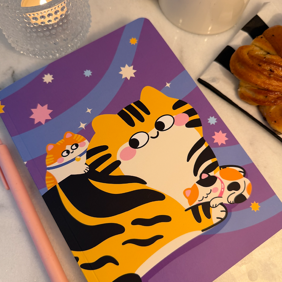 Stripe Squad softcover notebook with playful illustrated cats on a purple and blue cover