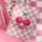 Cherry Good Friends Pink Softcover Notebook styled on a pink desk with a matching pen and kawaii stationery.