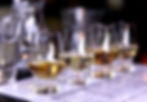 Close-up _ selective focus a flight of whiskies. Four different whiskies in whisky tasting