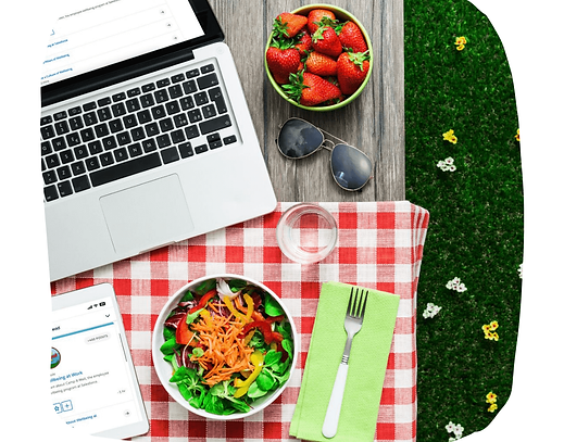 A picnic table with a learning course on a laptop.