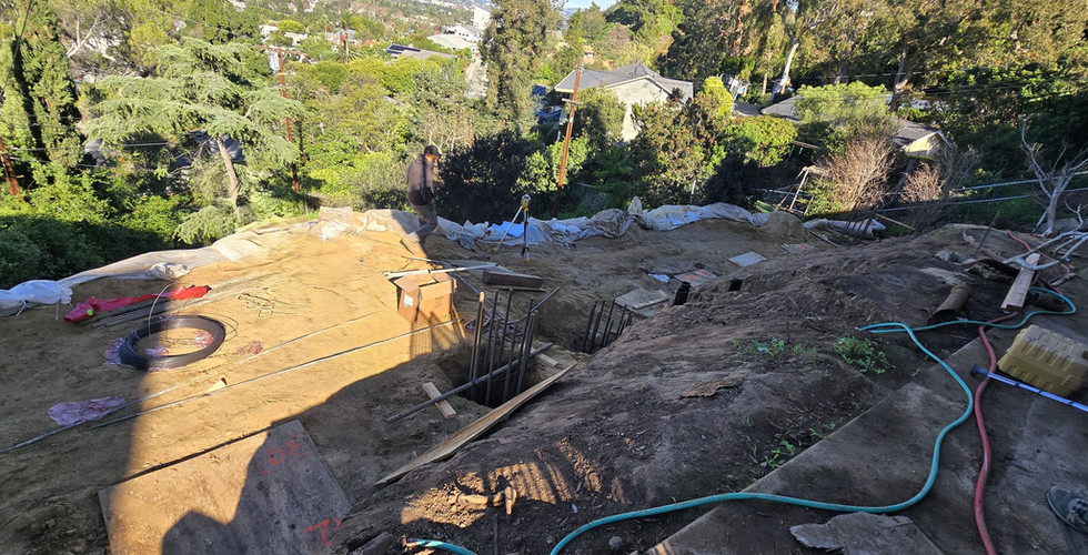 Sinai Construction is protecting this hillside from another mudslide by building a retaining wall