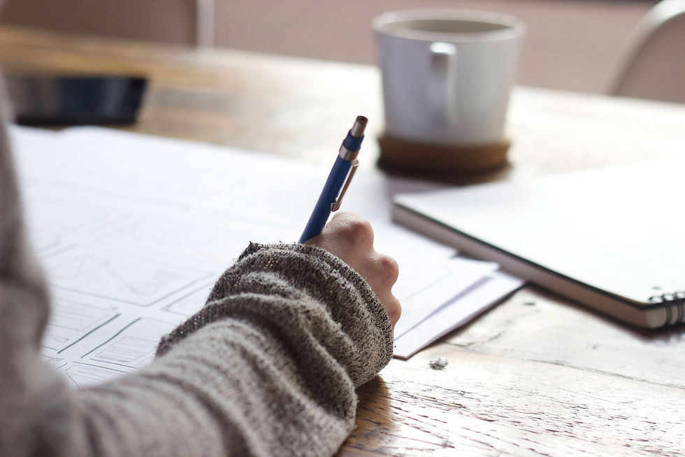 Person Writing Notes