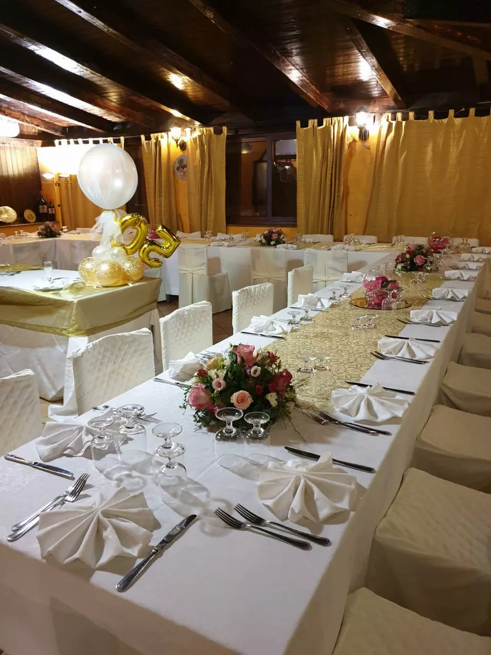 Eye-level view of a cozy dining table set for a dinner party