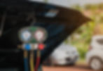 close-up-meter-hanging-from-car-hood.jpg