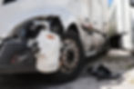 Damage closeup on white truck..jpg