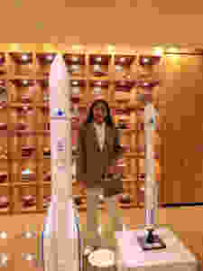 Kareema khan next to model aircraft