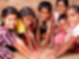 Group of smiling, happy children at a orphanage in bangalore supported by Reach Lives. The mood is happy.