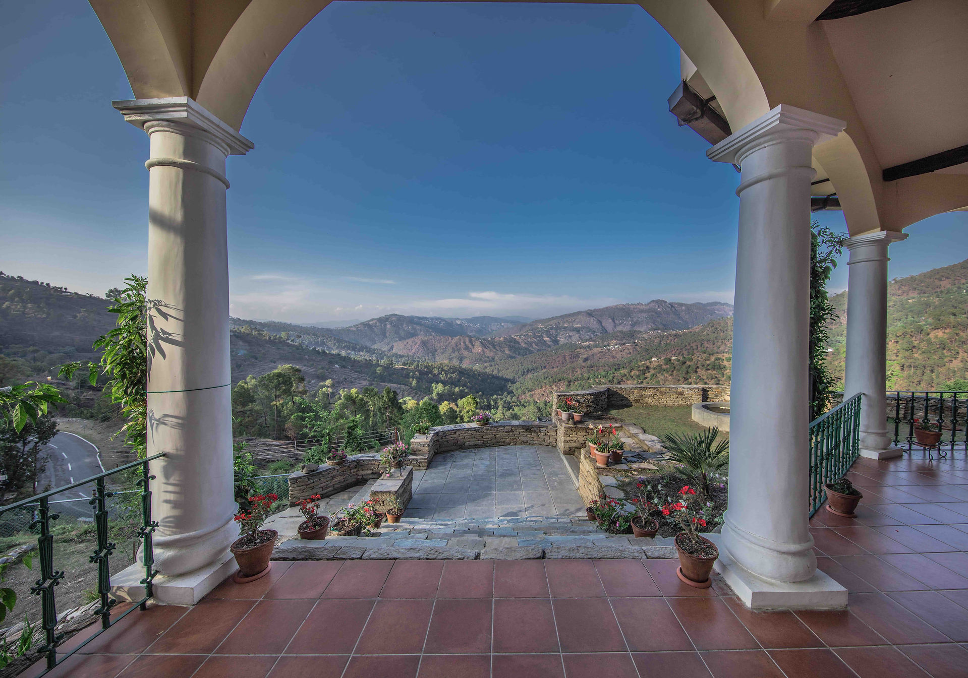 Rolling hills, winding roads, pine forests and trees laden with apples, oranges and other fruits set the scenery at The Orchard.