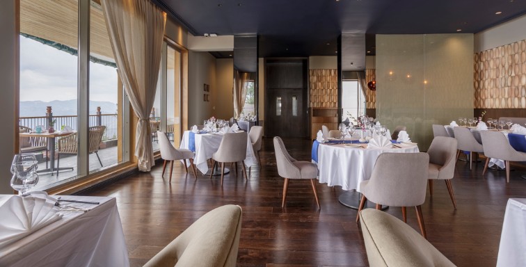 Patiala Room At Taj Theog Dining Area - Step into the Patiala Room and embark on a gastronomic journey through the vibrant and diverse landscape of Indian cuisine. From rich curries to flavorful tandoori delights, each dish is an ode to the land of spices. The sophisticated ambiance enhances the dining experience, making it a perfect choice for those seeking an authentic Indian culinary adventure.