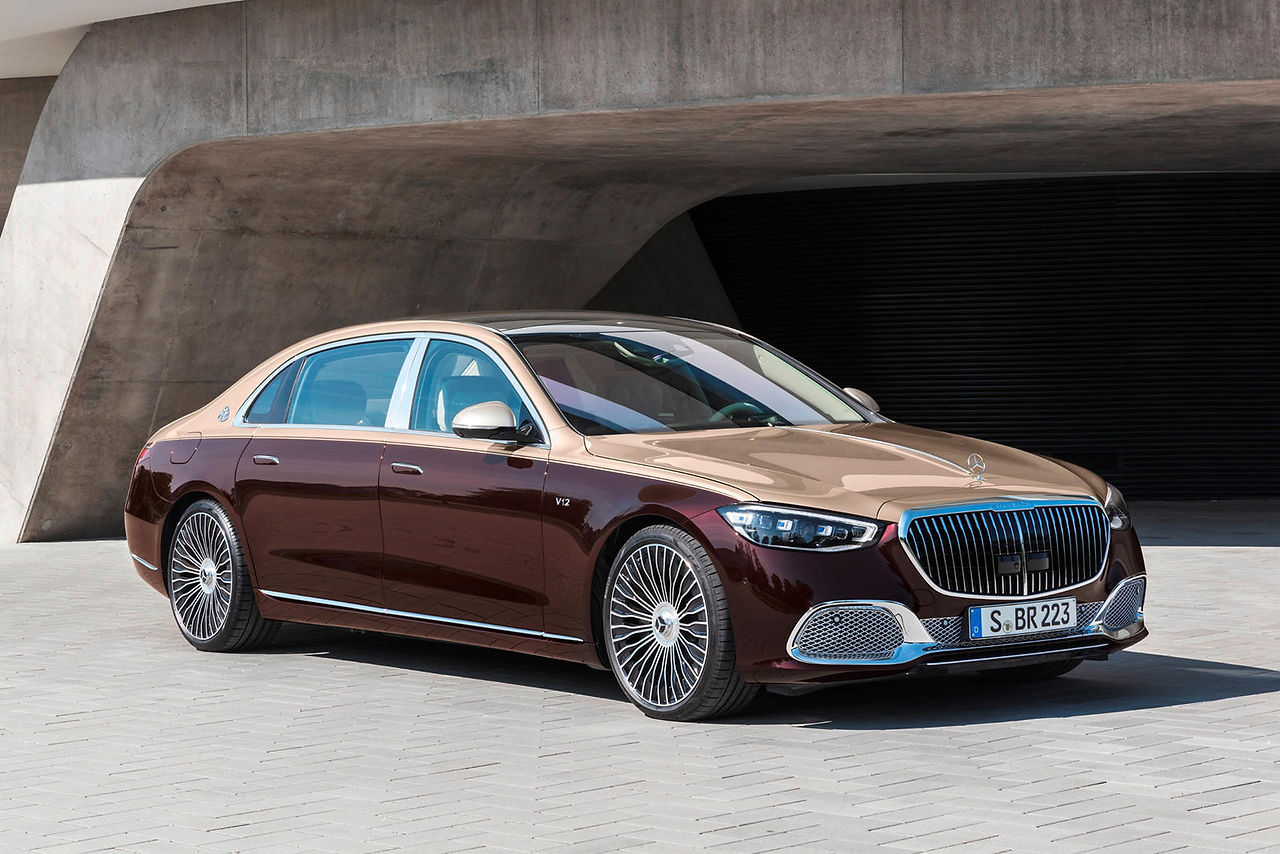 stainless steel engine hood trim strip, a distinctive front bumper and radiator grille with carved "Maybach" lettering