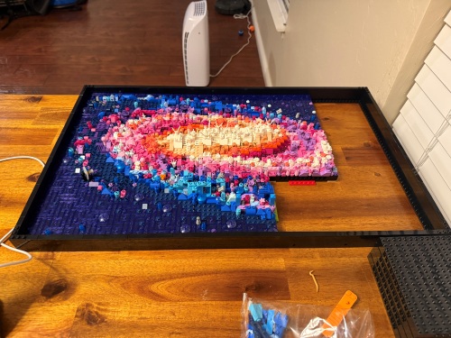 A partially built LEGO Milky Way set