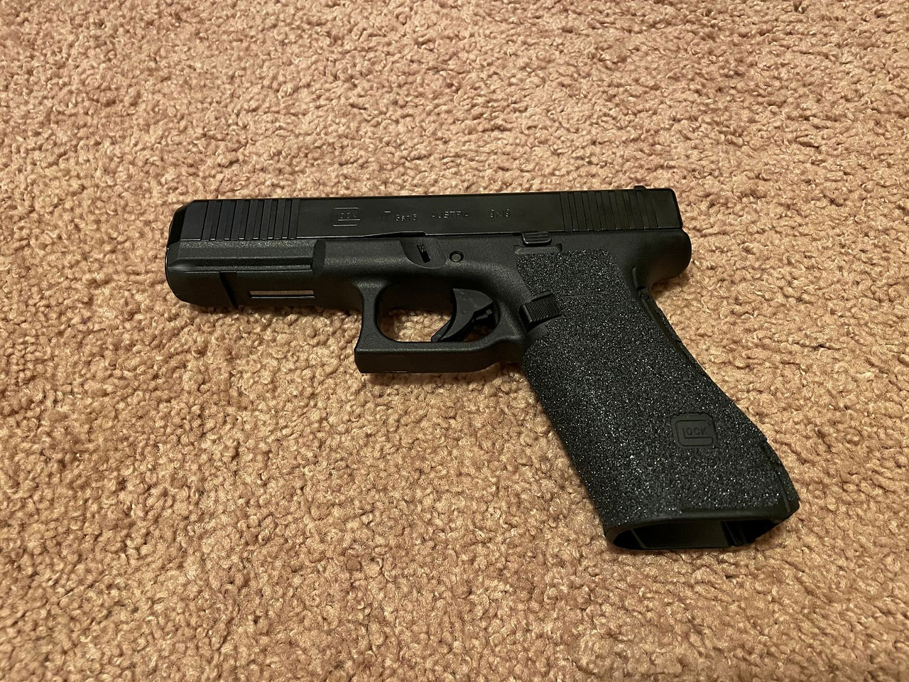 A Glock 17 on carpet