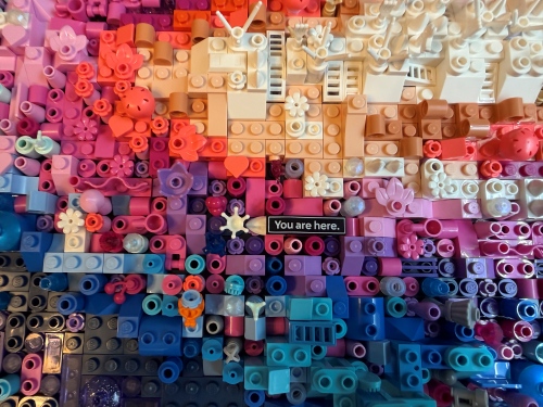 A zoomed in picture of a "You are here" sign on the LEGO Milky Way set