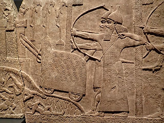 Assyrian_relief_of_attack_on_an_enemy_town_during_the_reign_of_Tiglath-Pileser_III_720-743