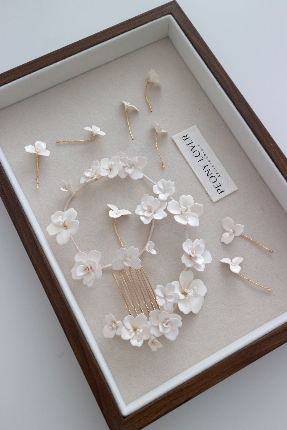 Thumbnail: White Flower Bridal Headpiece | MARMIA