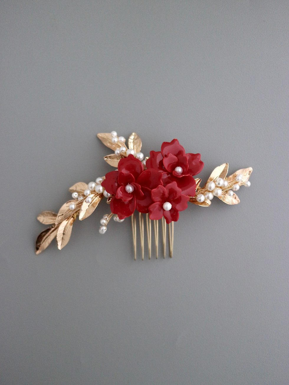 Thumbnail: REI | Red Flower Hairpiece