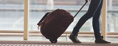 Jeffrey Lumsden Private passenger Transport at Sydney International Airport with a group of people conducting an Airport Transfer