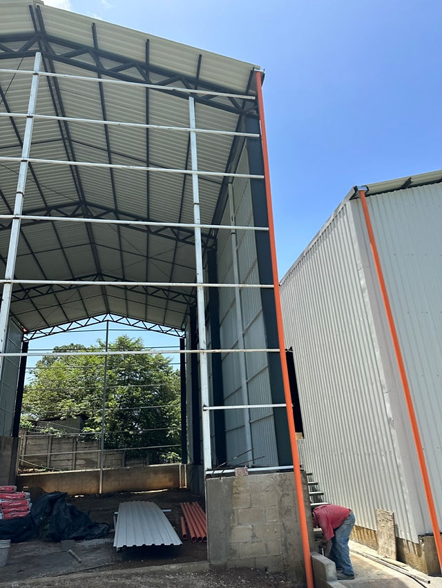 Building progress at the trade school site supported by Infinite Chance and Hogar Miguel Magone, showing walls being erected for the vocational training center.