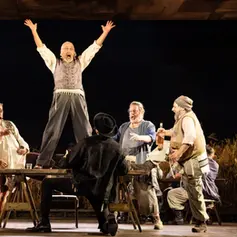 John Waters and cast in Fiddler on the Roof