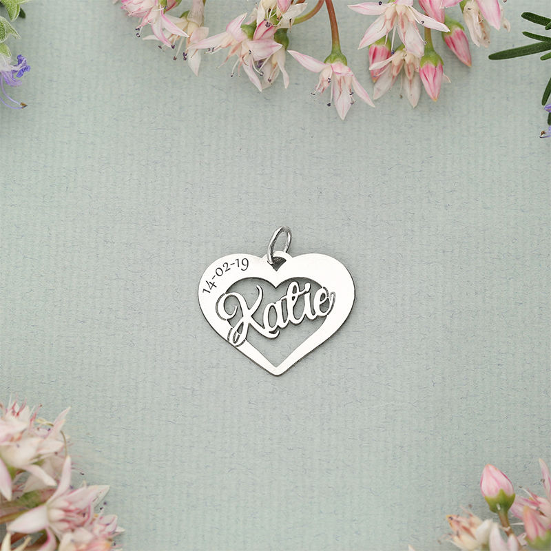 Heart charm with a name across