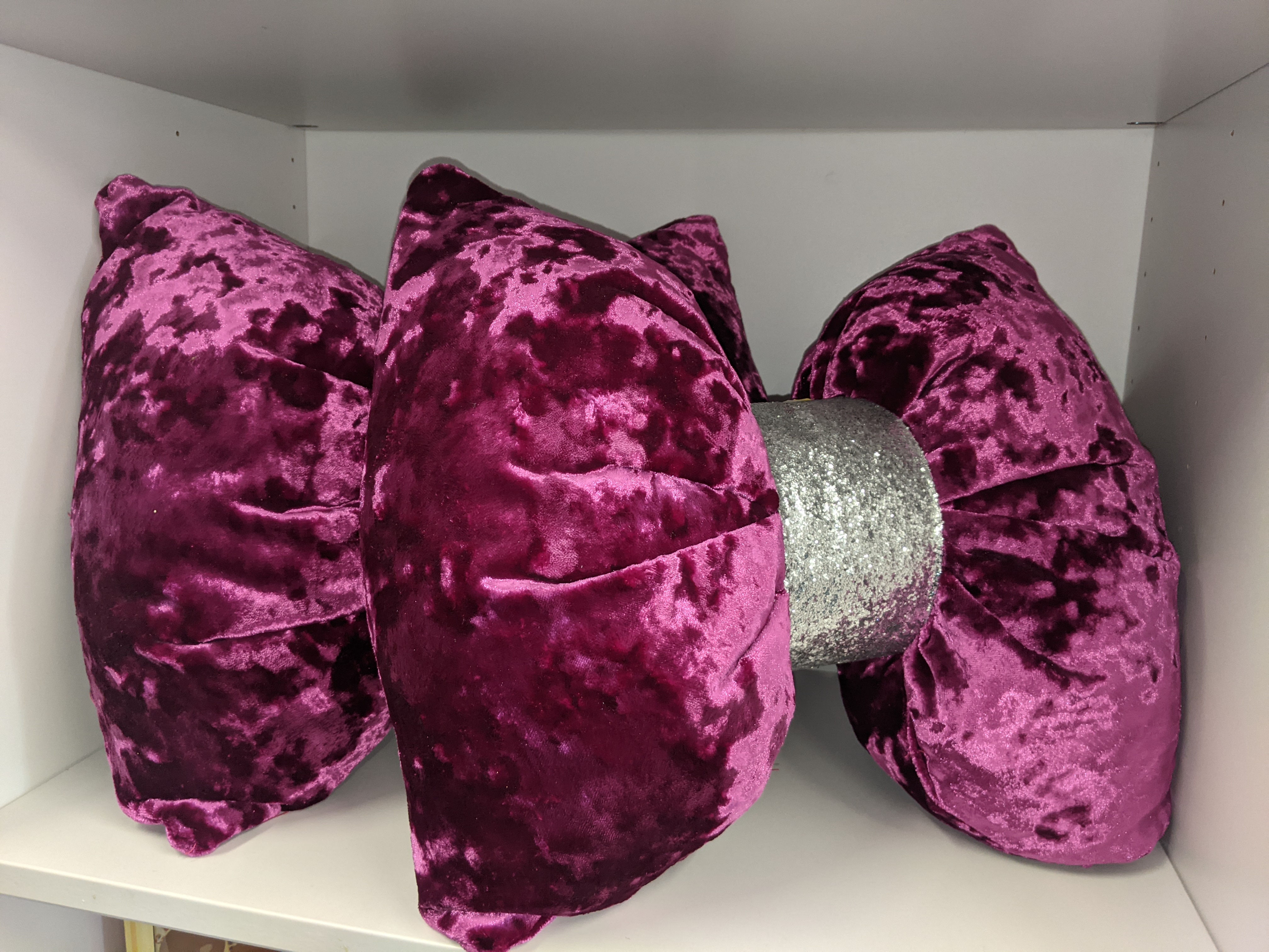Crushed velvet 18inch wide Cerise Pink deluxe bow cushion silver glitter centre