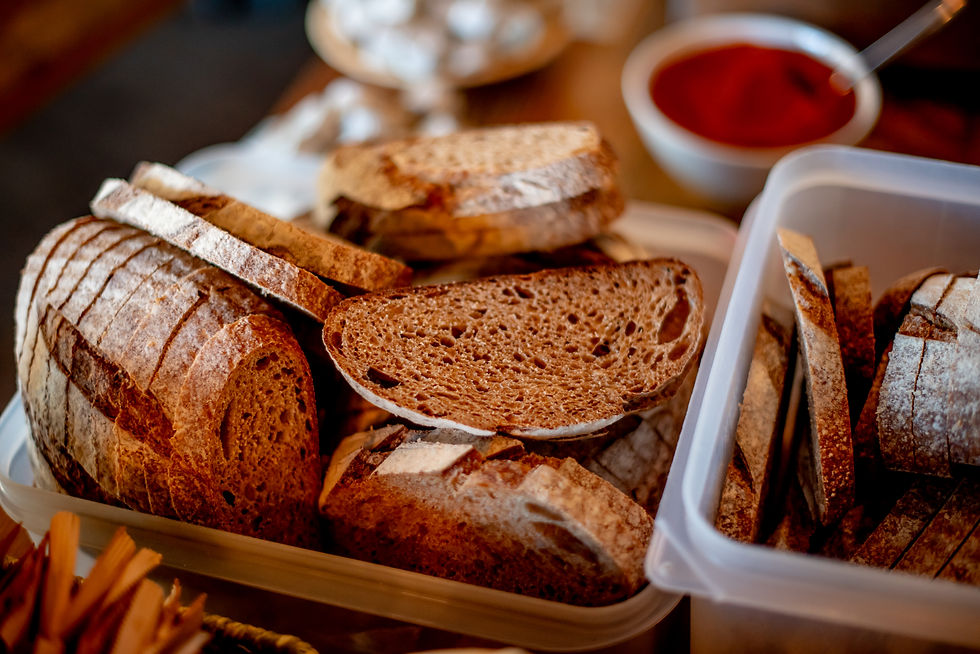 Bread and warming stew waits to be eaten.