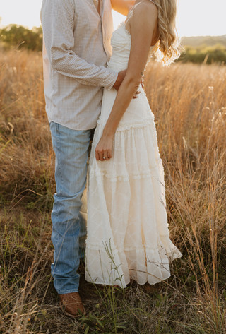 Close-up detail of bride-to-be adjusting engagement ring during Austin engagement session at Commons Ford Ranch