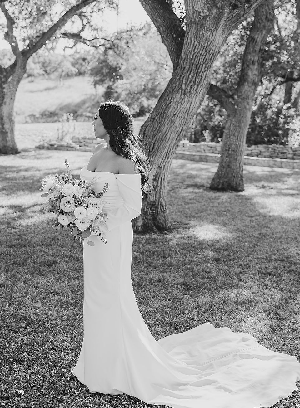 Black and white bridal portrait at The Addison Grove during a Dripping Springs wedding, photographed by Grace J Photo, a Dripping Springs wedding photographer known for timeless Hill Country imagery.