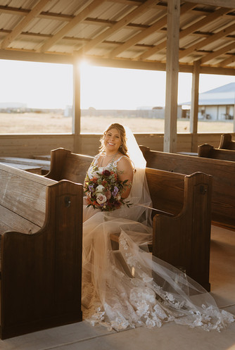 Bridal portrait inside the open-air chapel at The Allen Farmhaus in New Braunfels.