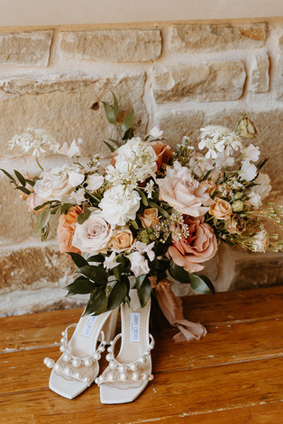 Wedding bouquet detail with soft natural light at Canyonwood Ridge in Dripping Springs, Texas wedding